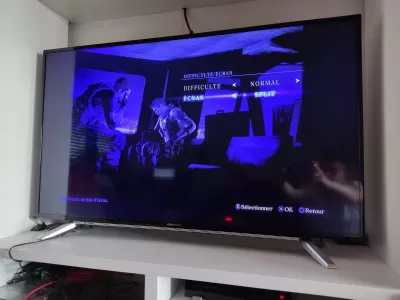 Multiplayer couch games for PS4 : Selecting the split screen option when starting a new campaign in Resident Evil 6 to play couch coop on PS4